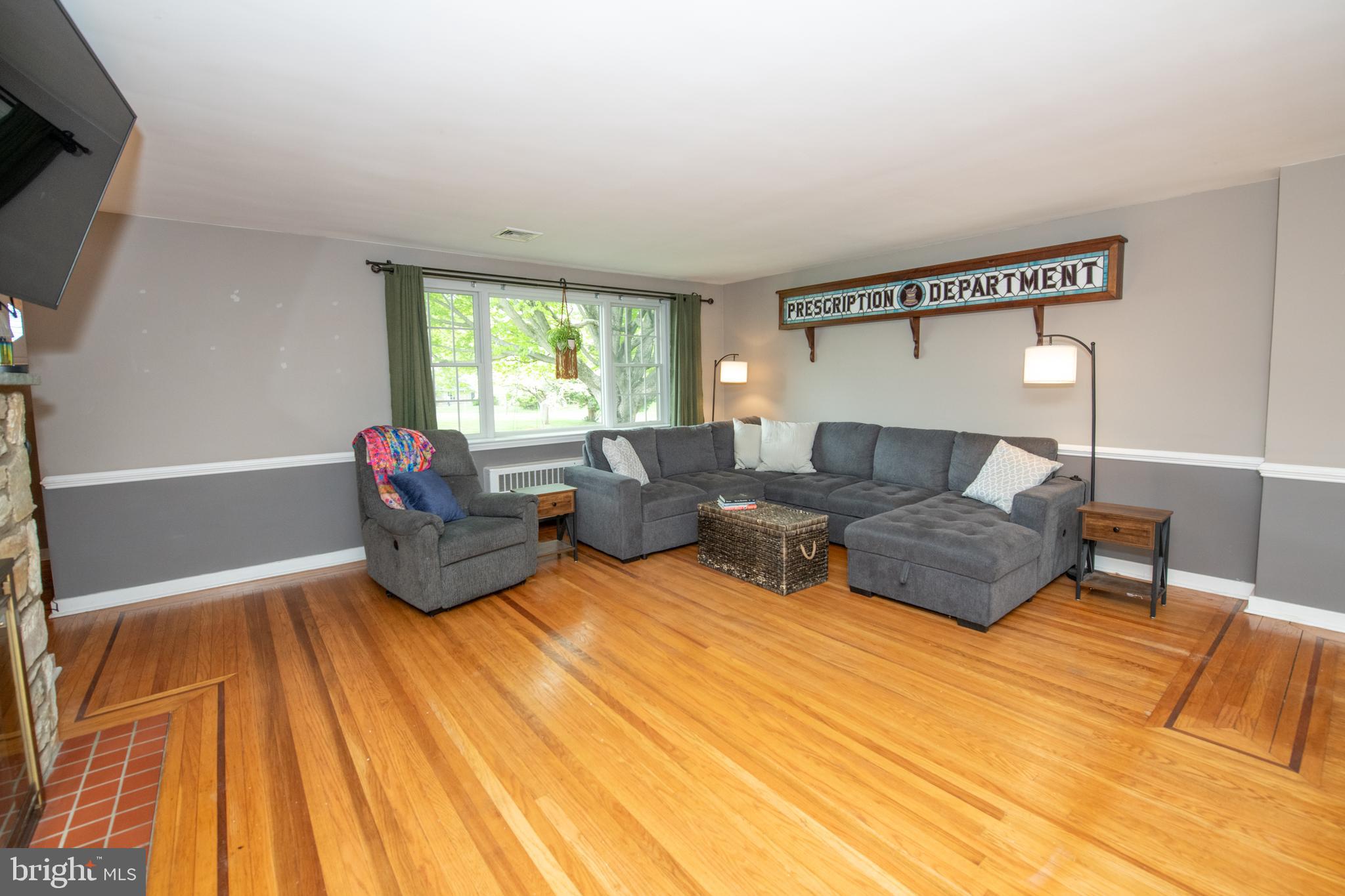 1259 Glenbrook Road Huntingdon Valley, PA 19006 - Photo 23 of 78 a living room with furniture and a large window