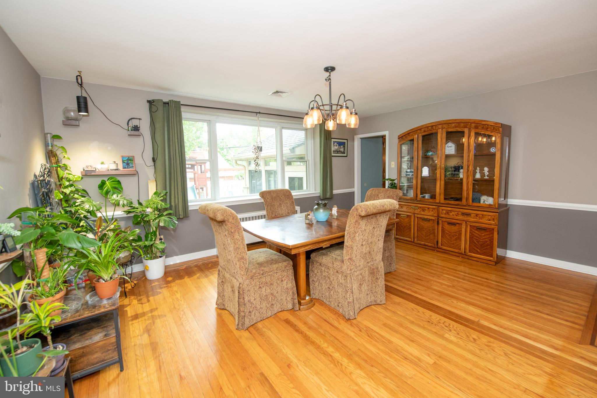 1259 Glenbrook Road Huntingdon Valley, PA 19006 - Photo 28 of 78 a view of a dining room with furniture window and wooden floor