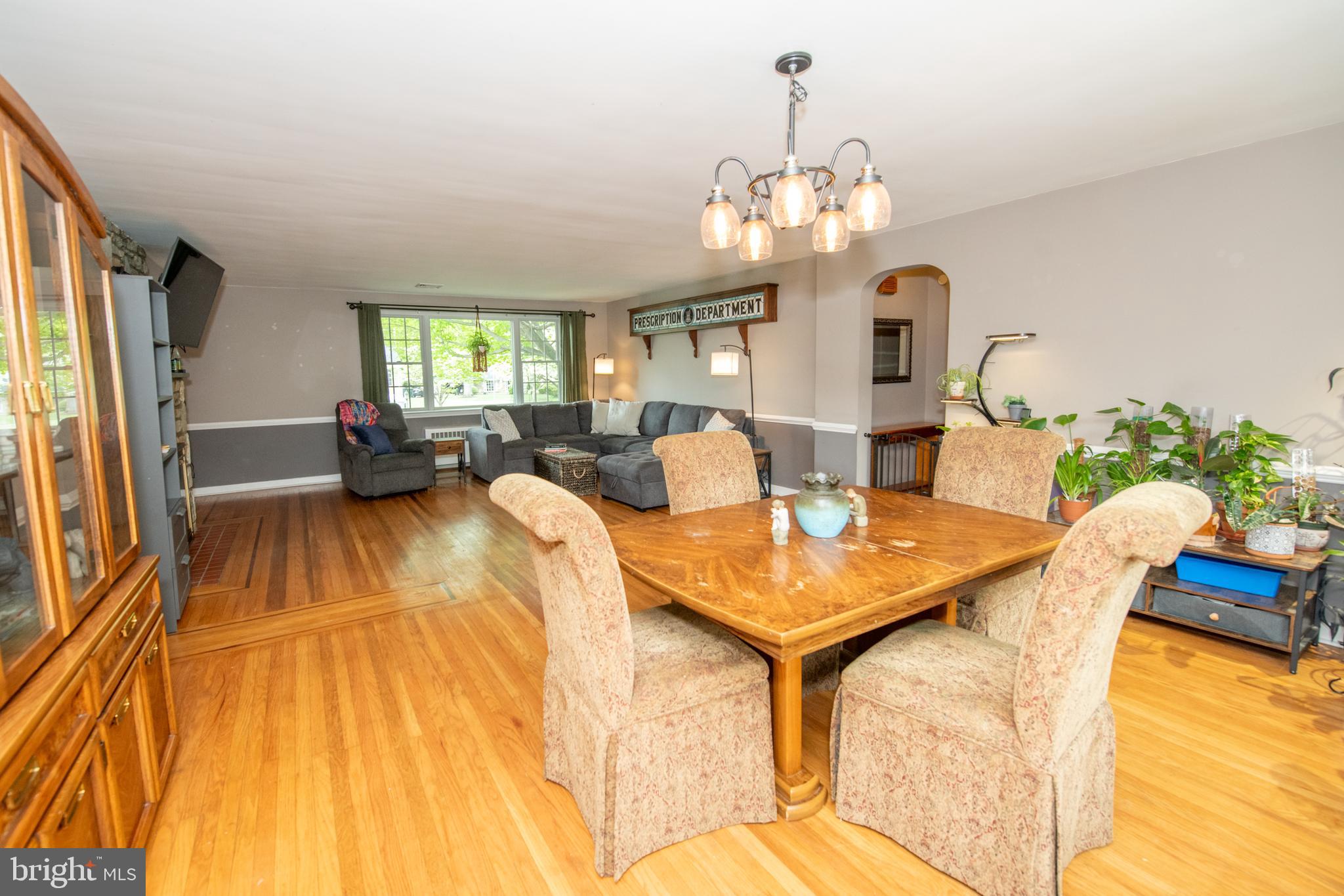 1259 Glenbrook Road Huntingdon Valley, PA 19006 - Photo 29 of 78 a view of a dining room with furniture and a chandelier