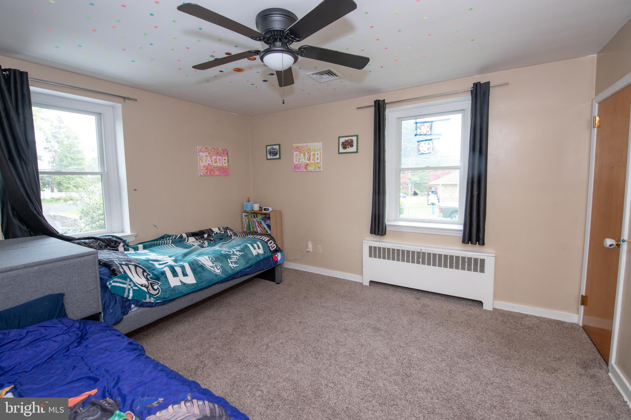 1259 Glenbrook Road Huntingdon Valley, PA 19006 - Photo 48 of 78 a bedroom with furniture and a window