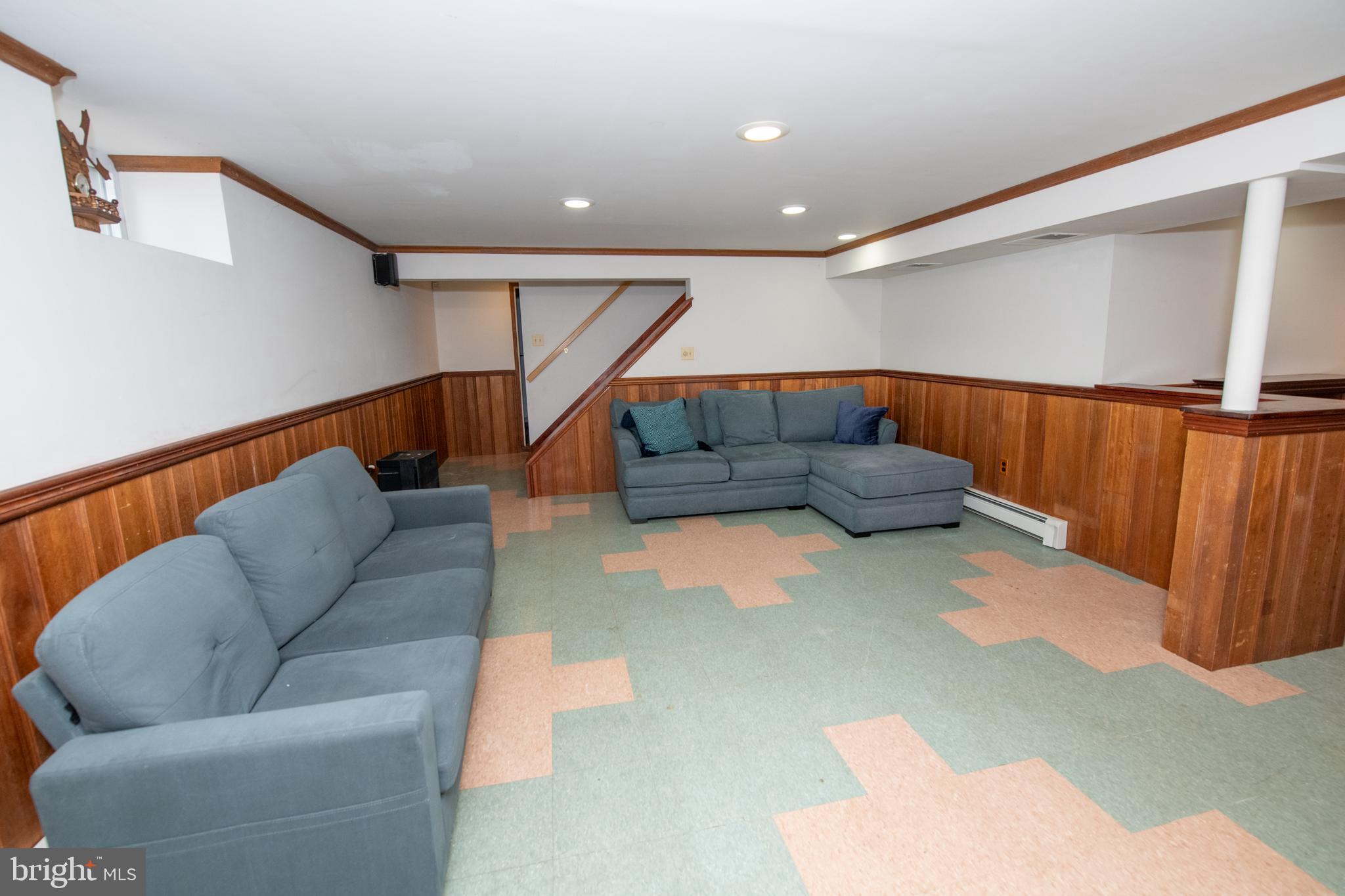 1259 Glenbrook Road Huntingdon Valley, PA 19006 - Photo 62 of 78 a living room with furniture and stairs