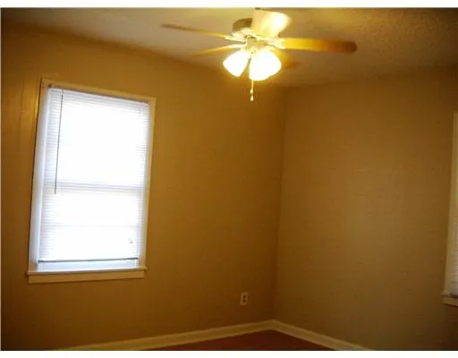 a view of a bathroom with a window