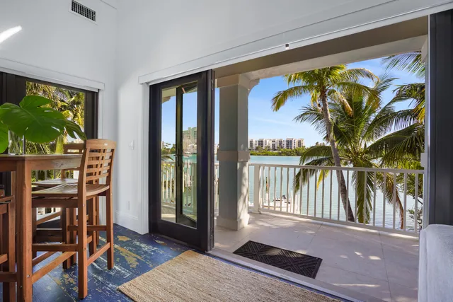 a view of a balcony with lake view