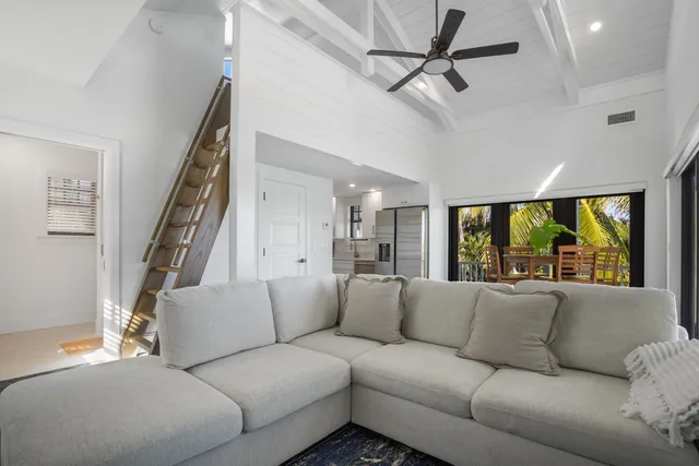 a bed room with a bed and a window