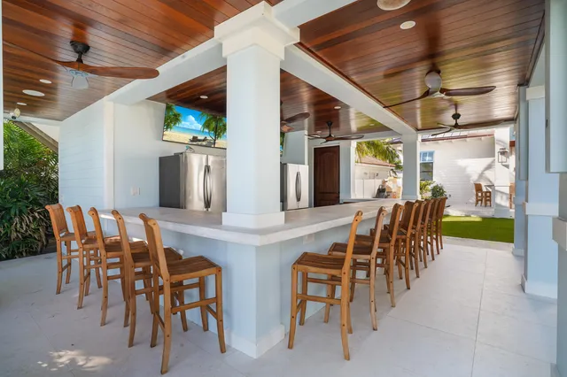 a bathroom with a bathtub and next to a window