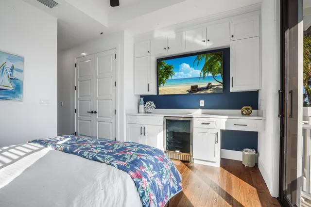 a view of entryway with wooden floor
