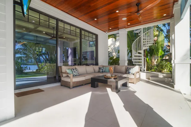 a bedroom with a bed and a mirror