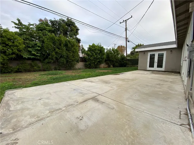 a view of a backyard of the house
