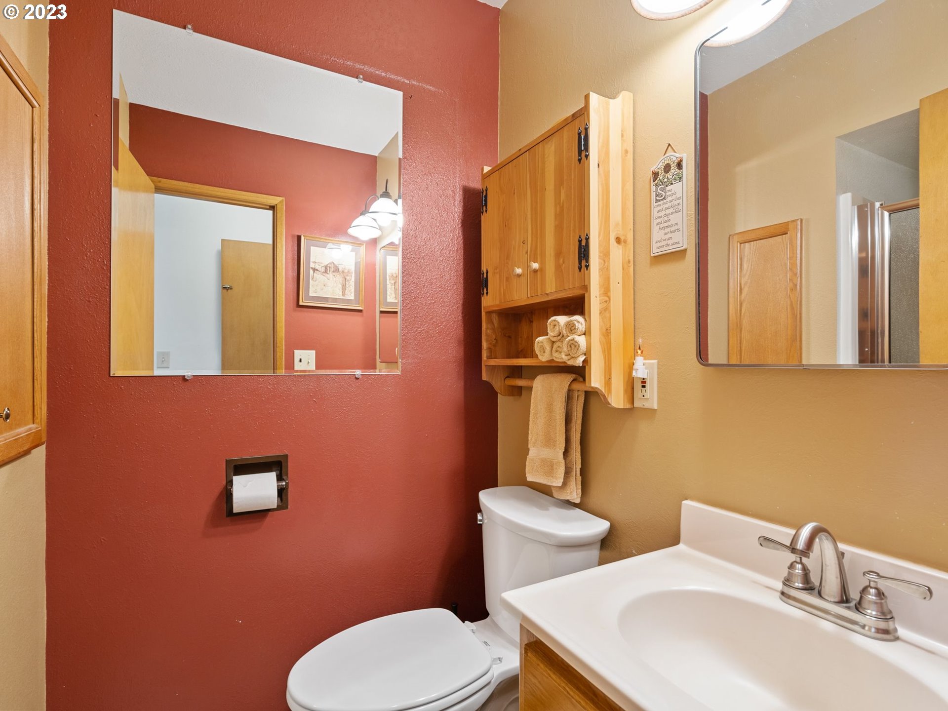 1341 Southwest 40th Street Pendleton, OR 97801 - Photo 32 of 35 a bathroom with a toilet a sink and mirror