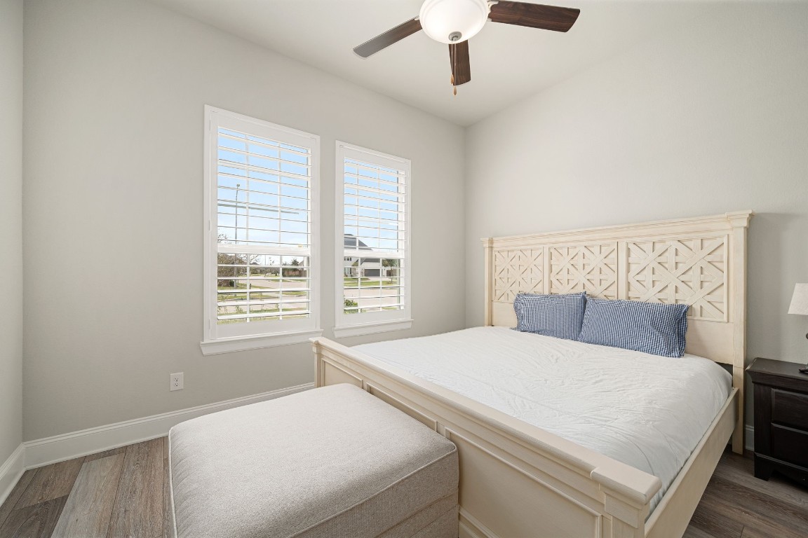 6203 Silver Lk Lane Manvel, TX 77578 - Photo 26 of 50 a bedroom with a large bed and a window