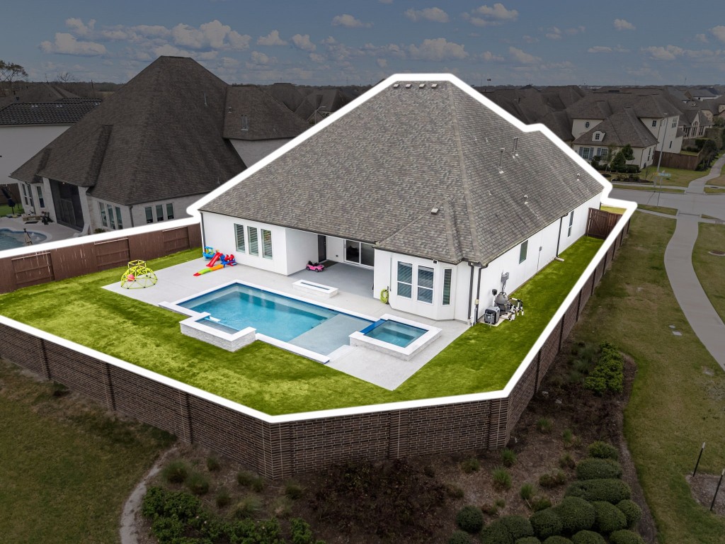 6203 Silver Lk Lane Manvel, TX 77578 - Photo 40 of 50 a view of a house with pool