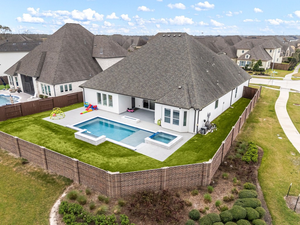 6203 Silver Lk Lane Manvel, TX 77578 - Photo 4 of 50 a view of a house with a yard