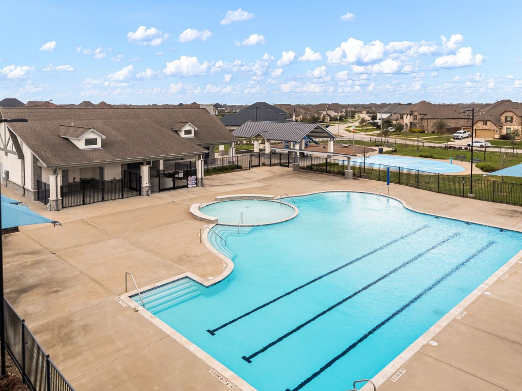 6203 Silver Lk Lane Manvel, TX 77578 - Photo 49 of 50 a view of a swimming pool with a mountain
