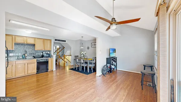 a view of a kitchen and dining room