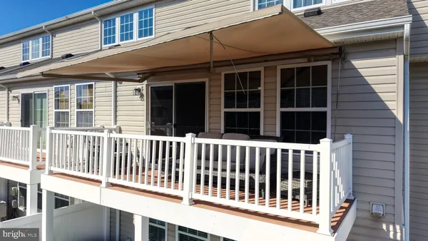 a view of a house with a deck