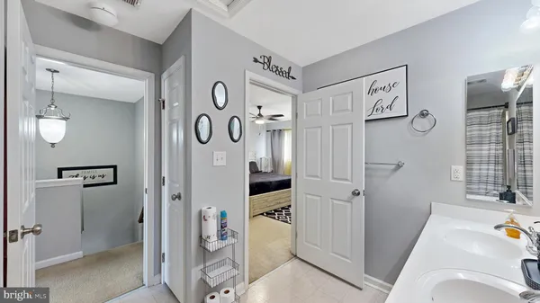 a bathroom with a tub and shower