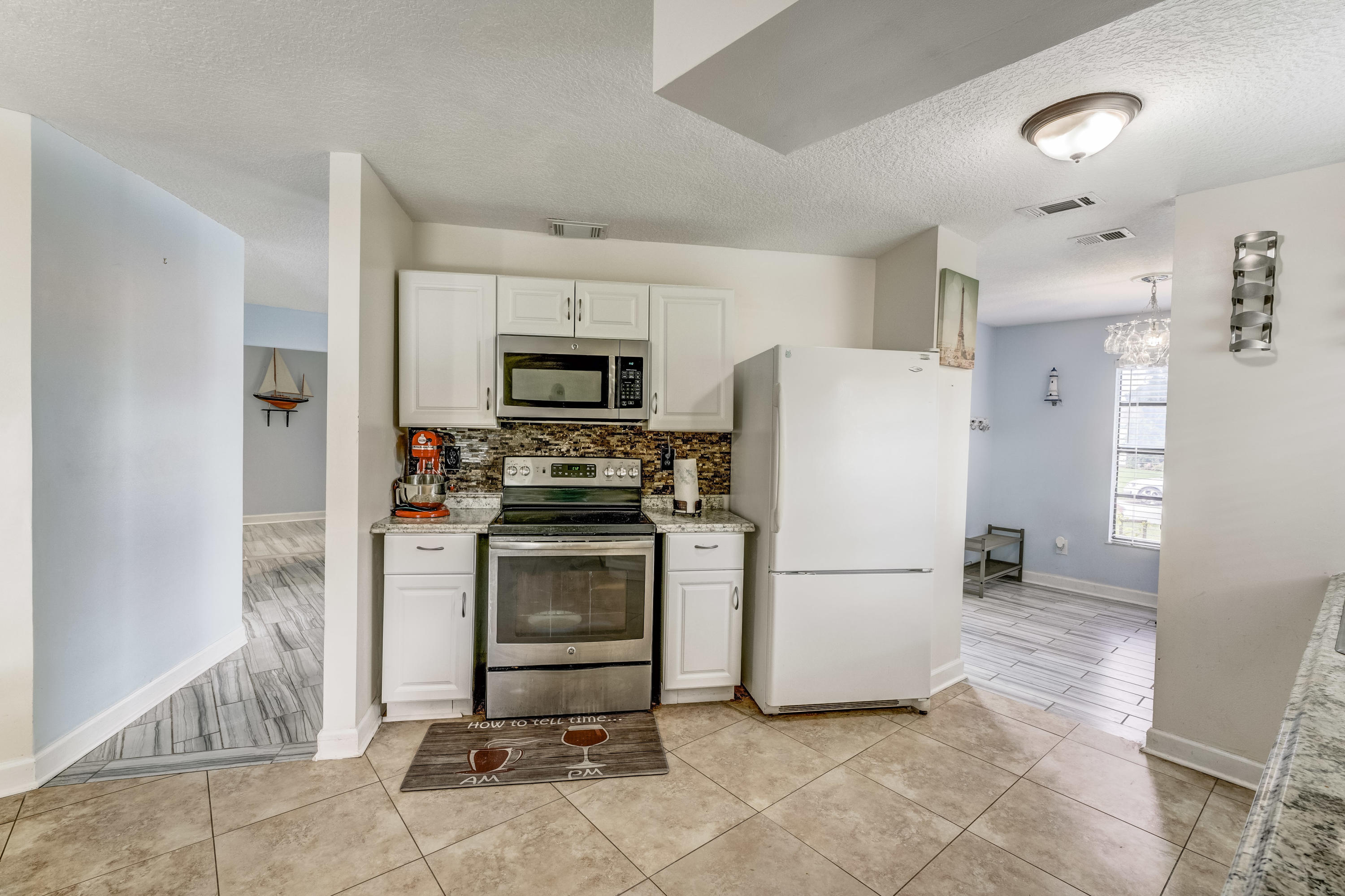 6120 Wolfe Street Jupiter, FL 33458 - Photo 6 of 55 Upgraded Kitchen