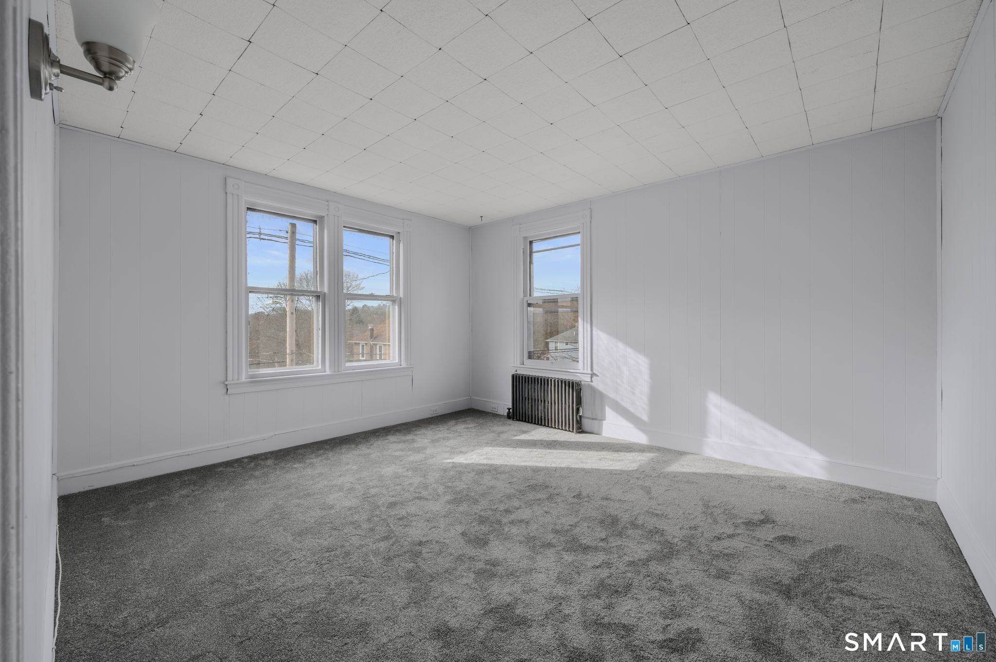 45 Dunham Street Norwich, CT 06360 - Photo 19 of 40 an empty room with windows