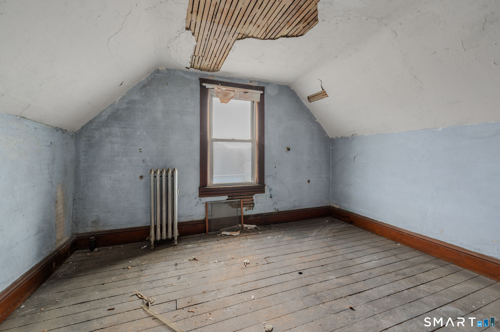 45 Dunham Street Norwich, CT 06360 - Photo 25 of 40 a view of an empty room with a window