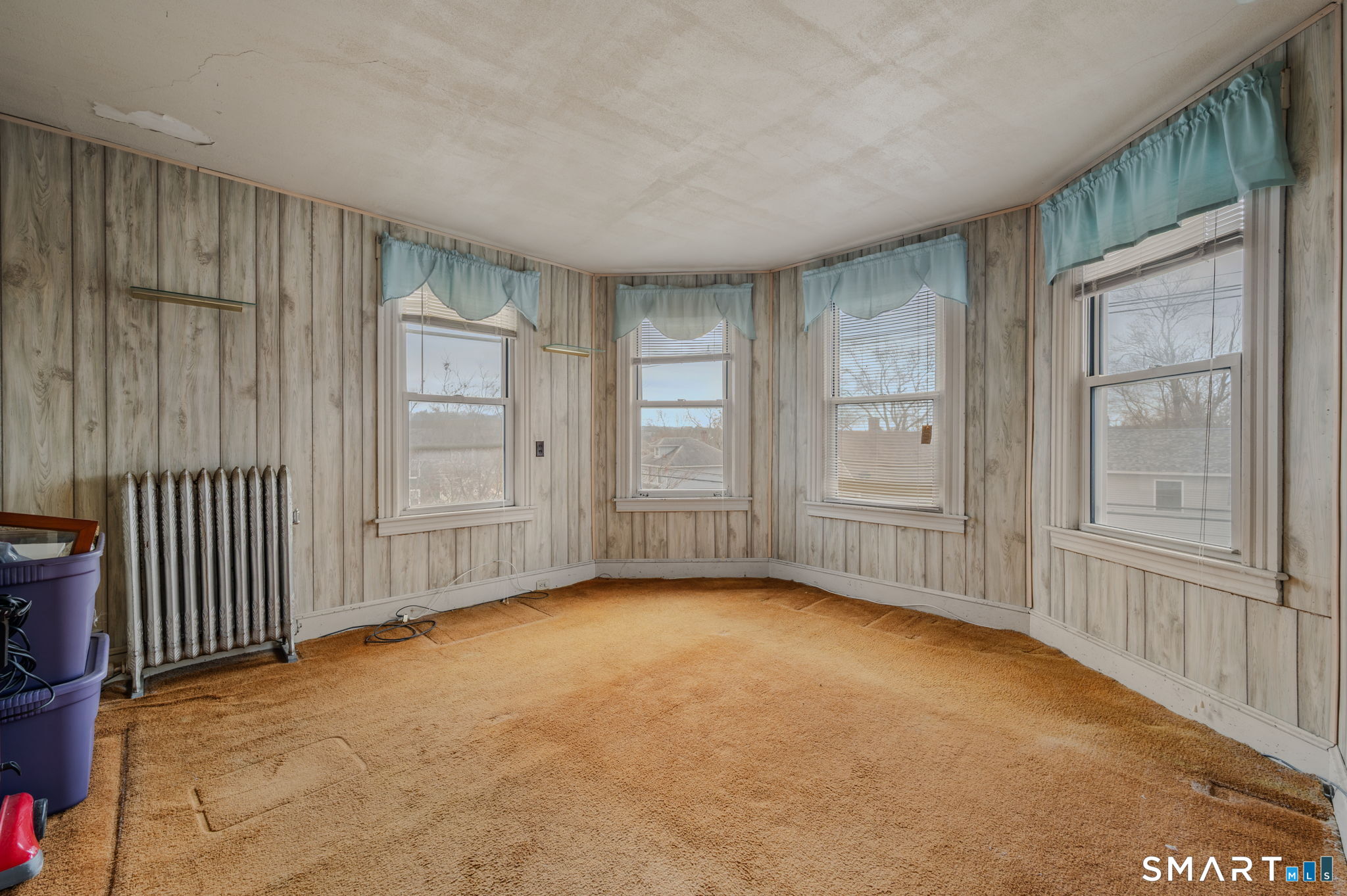 45 Dunham Street Norwich, CT 06360 - Photo 27 of 40 a view of an empty room with a window