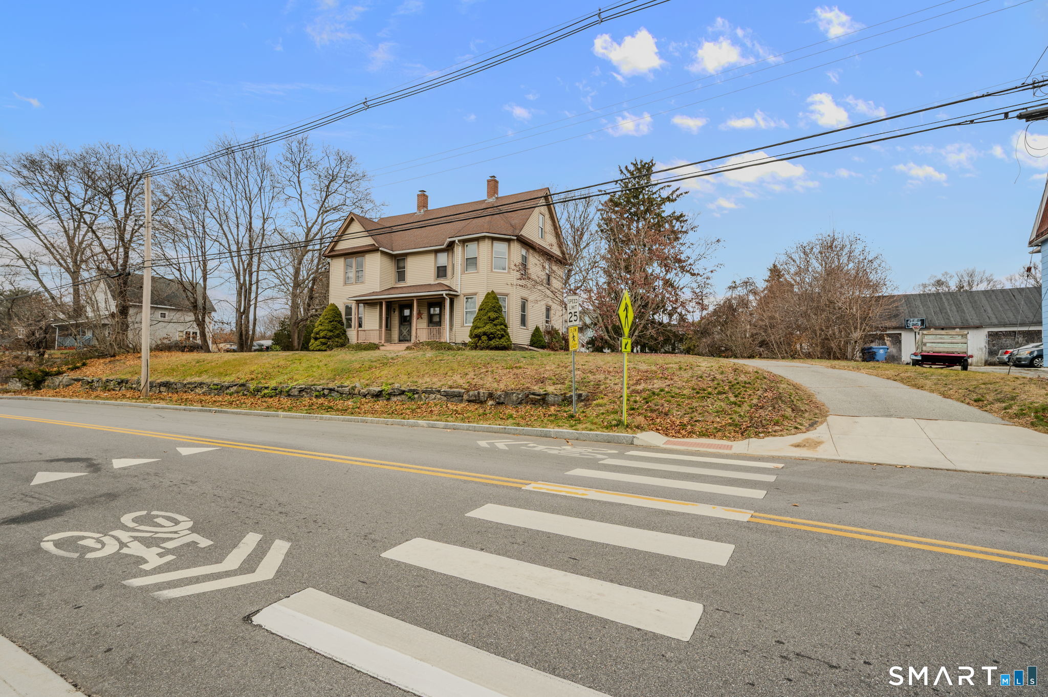 45 Dunham Street Norwich, CT 06360 - Photo 4 of 40 a view of a building with a street