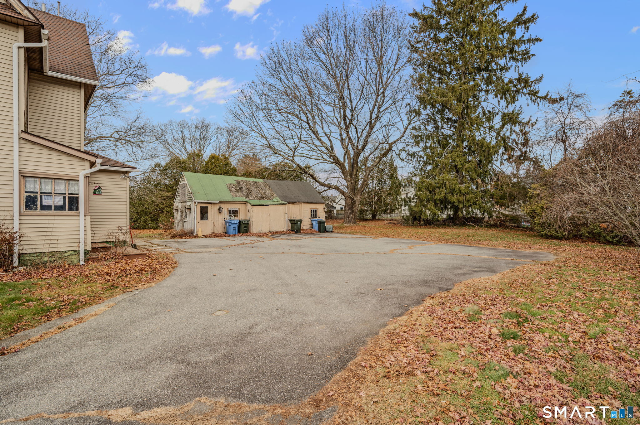 45 Dunham Street Norwich, CT 06360 - Photo 8 of 40 a view of road with yard and trees