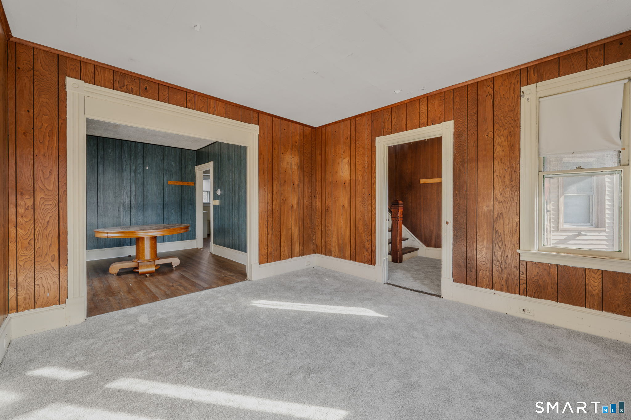 45 Dunham Street Norwich, CT 06360 - Photo 9 of 40 a bedroom with furniture and a window