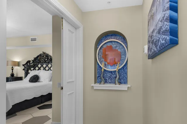 a bathroom with a shower sink and mirror