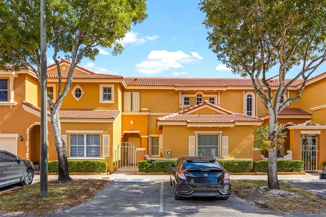 a car parked in front of a house