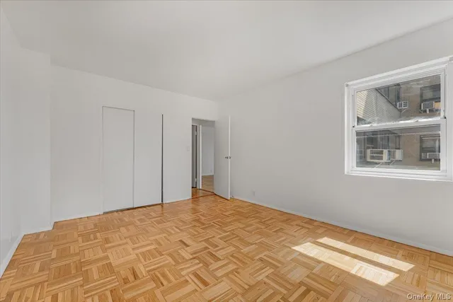 a view of empty room with windows