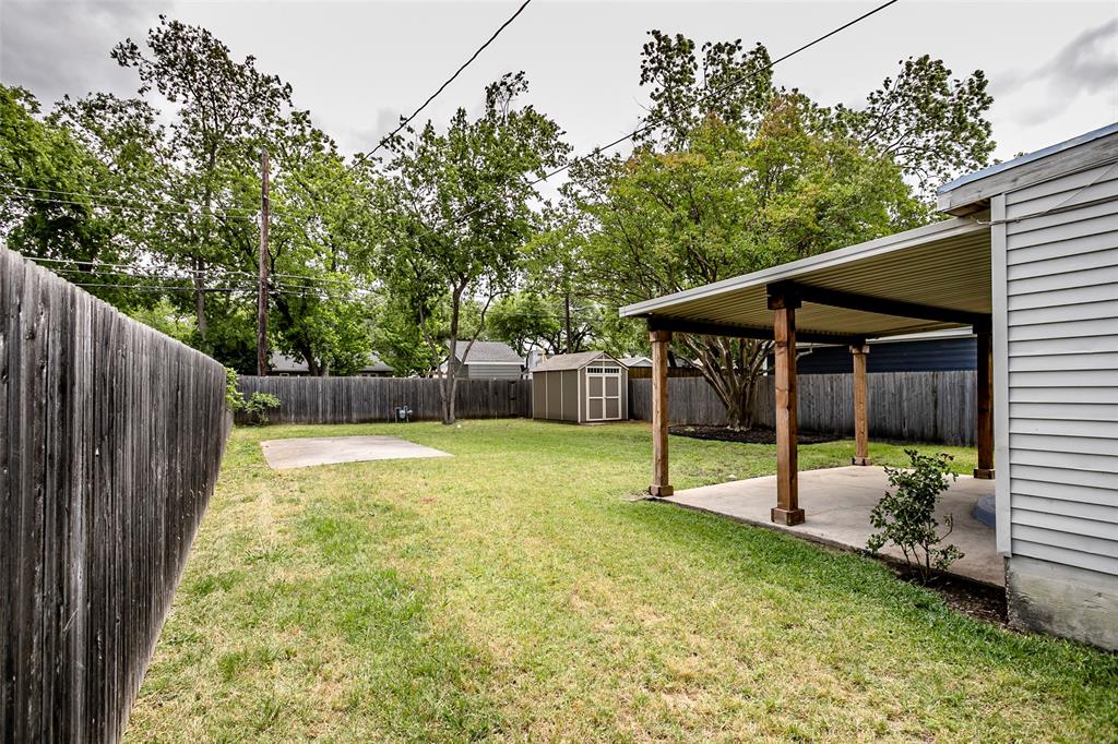 7410 Caillet Street Dallas, TX 75209 - Photo 24 of 25 a view of backyard with small cabin