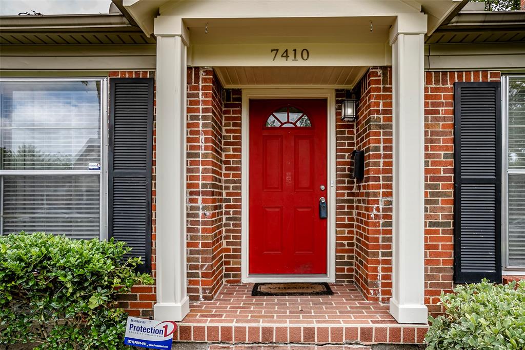 7410 Caillet Street Dallas, TX 75209 - Photo 3 of 25 a door with red door