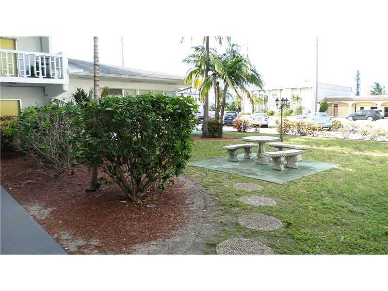1250 East Sample Road, Unit 209 Pompano Beach, FL 33064 - Photo 2 of 4 Exterior Front