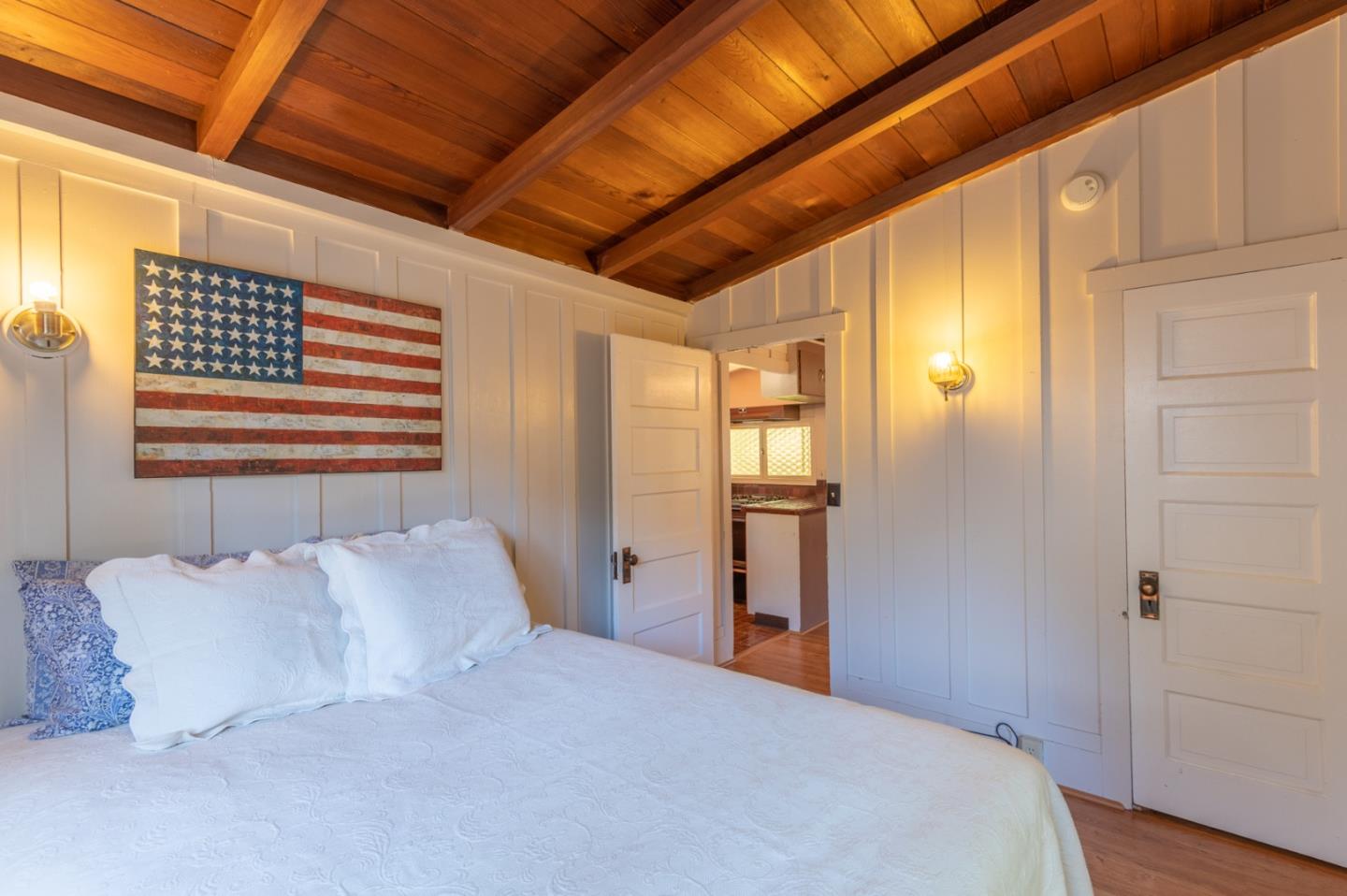 2 Mission Street Carmel, CA 93923 - Photo 19 of 31 a bedroom with a bed and a window