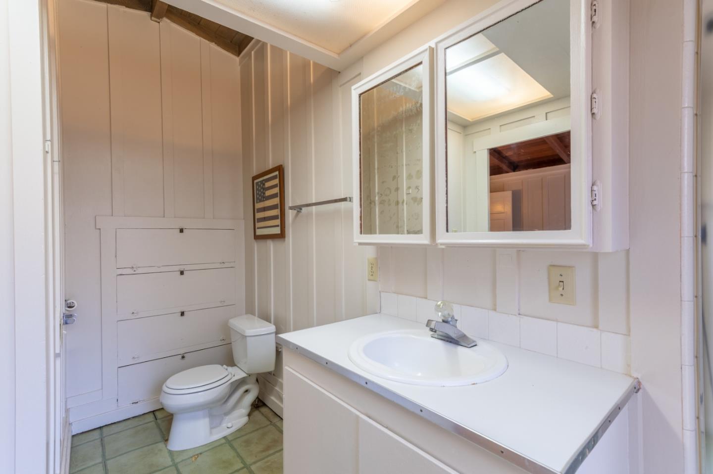 2 Mission Street Carmel, CA 93923 - Photo 21 of 31 a bathroom with a sink toilet and shower