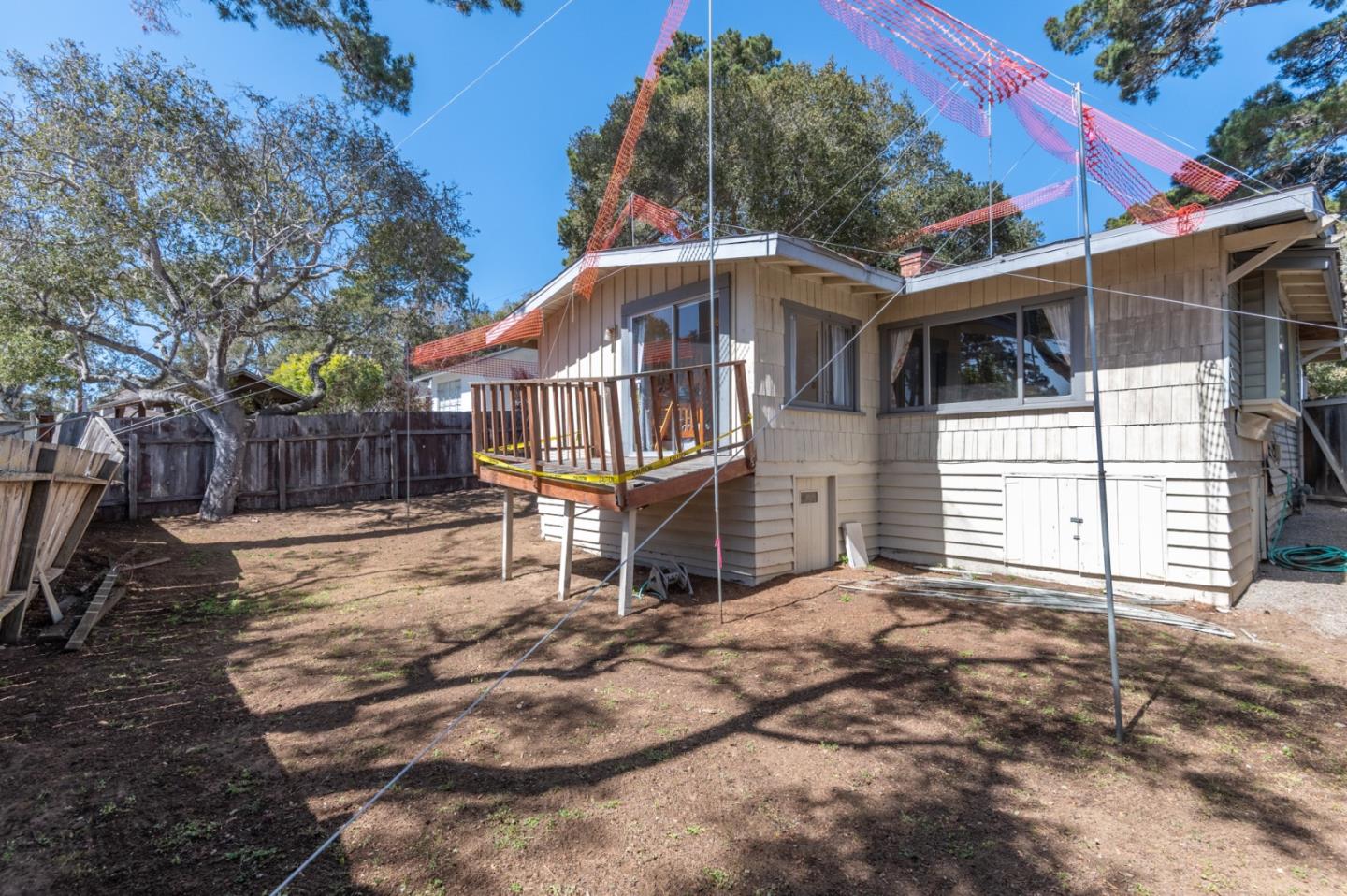 2 Mission Street Carmel, CA 93923 - Photo 26 of 31 a front view of a house with a yard