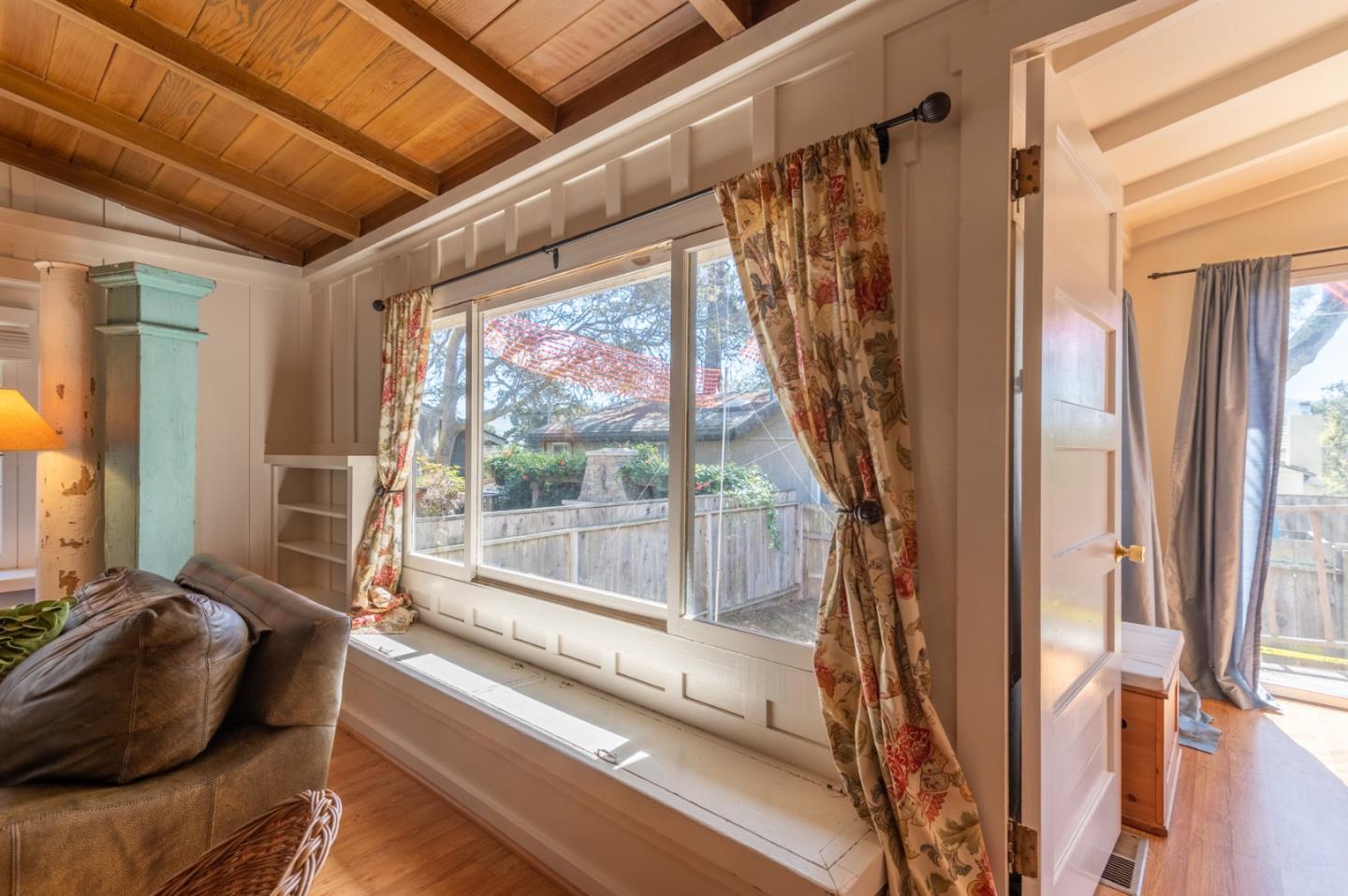 2 Mission Street Carmel, CA 93923 - Photo 5 of 31 a living room with furniture and a floor to ceiling window