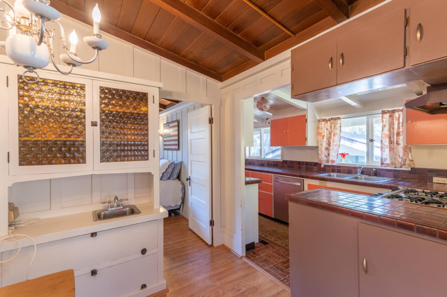 2 Mission Street Carmel, CA 93923 - Photo 7 of 31 a kitchen with granite countertop a sink cabinets and window