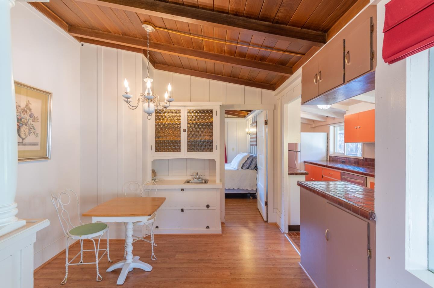 2 Mission Street Carmel, CA 93923 - Photo 9 of 31 a open kitchen with a table and chairs