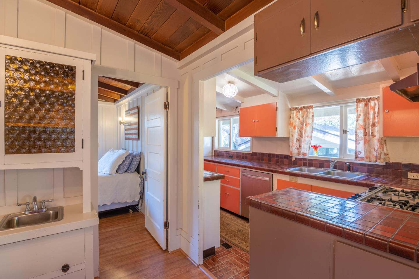 2 Mission Street Carmel, CA 93923 - Photo 10 of 31 a kitchen with stainless steel appliances granite countertop a sink and a refrigerator