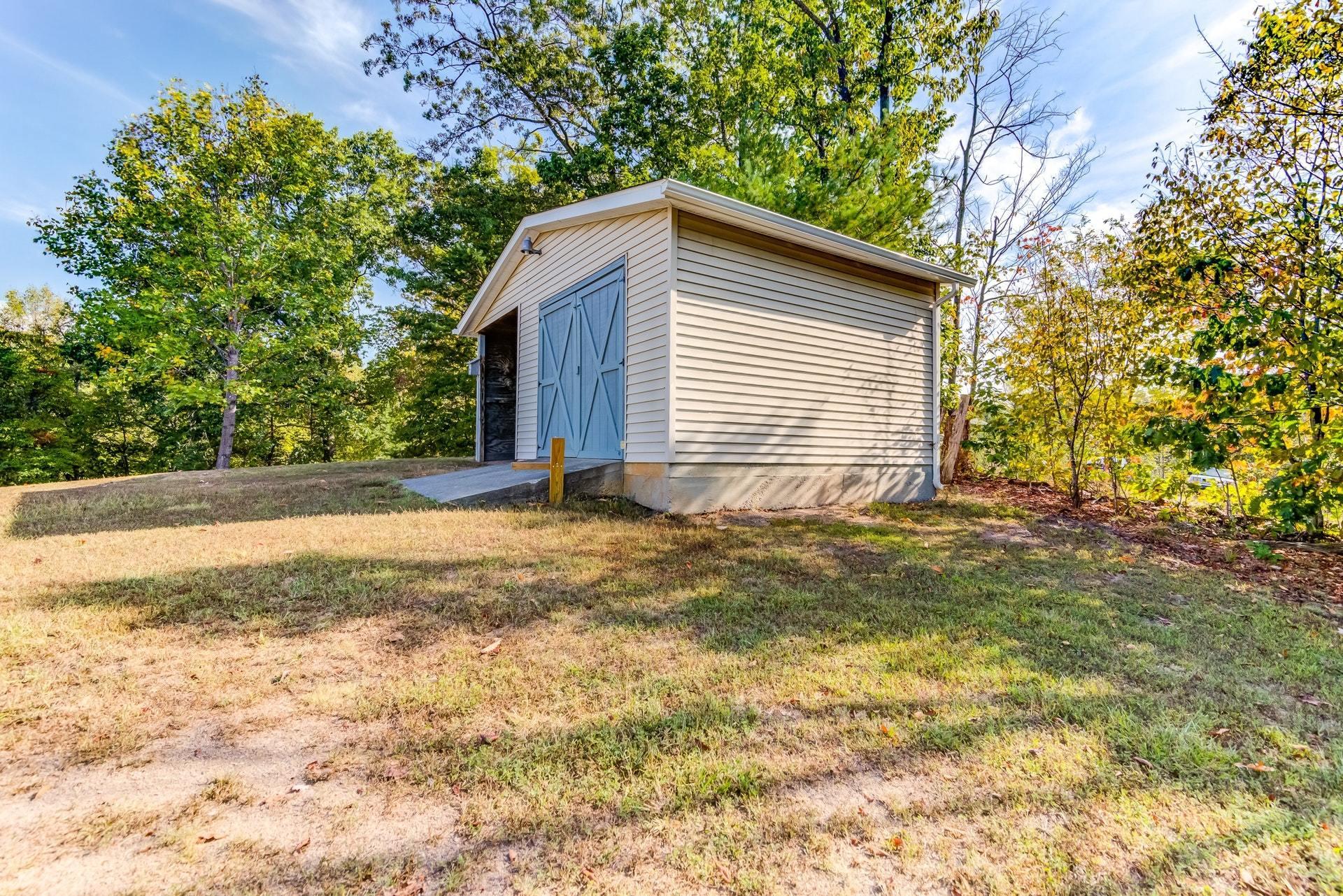1103 Milton Road Blue Ridge, VA 24064 - Photo 26 of 29 a view of a house with a yard