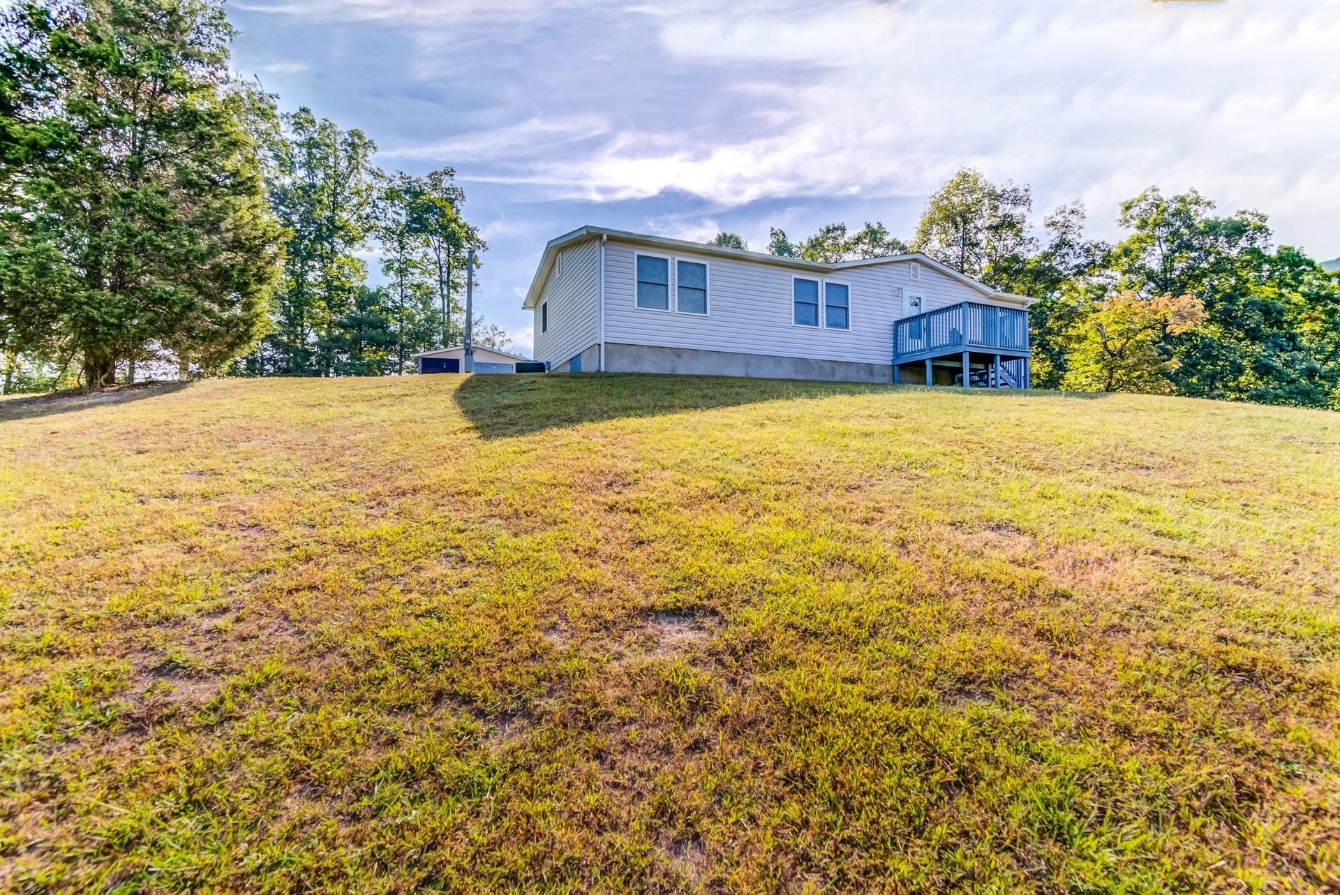 1103 Milton Road Blue Ridge, VA 24064 - Photo 27 of 29 a front view of house with yard