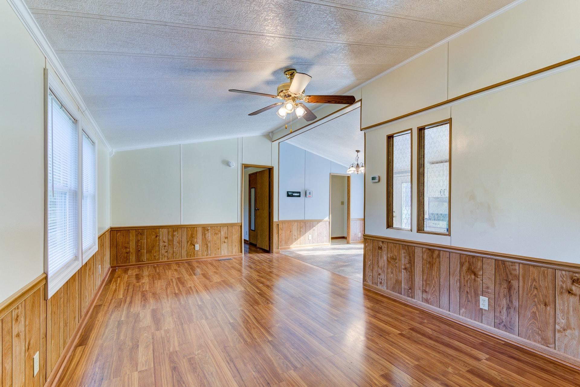 1103 Milton Road Blue Ridge, VA 24064 - Photo 7 of 29 a view of an empty room with wooden floor and a window