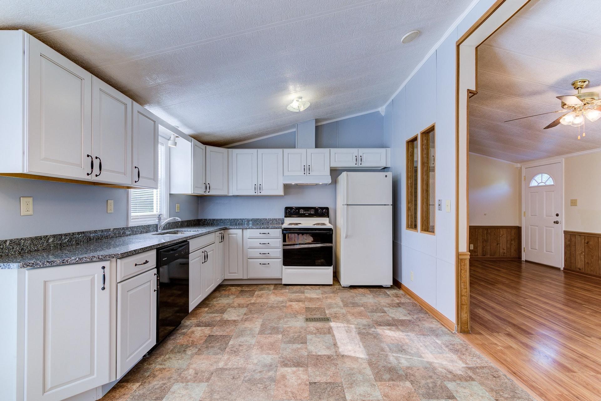 1103 Milton Road Blue Ridge, VA 24064 - Photo 10 of 29 a large kitchen with stainless steel appliances granite countertop a stove and a refrigerator