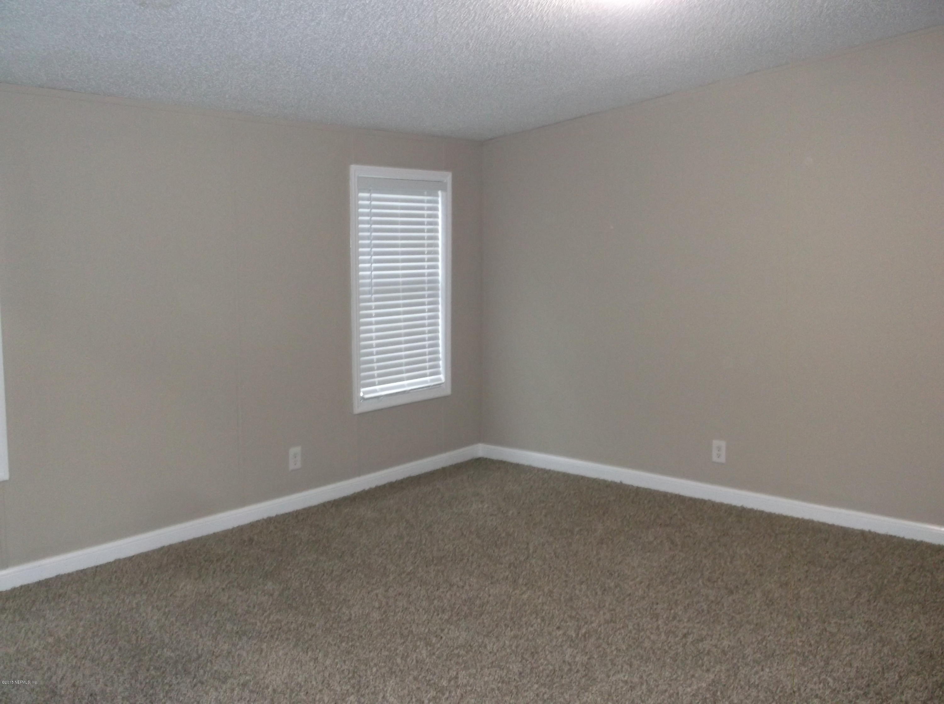 5697 Carter Spencer Road Middleburg, FL 32068 - Photo 11 of 11 Master Bedroom