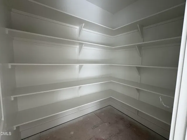 a empty closet with white paint