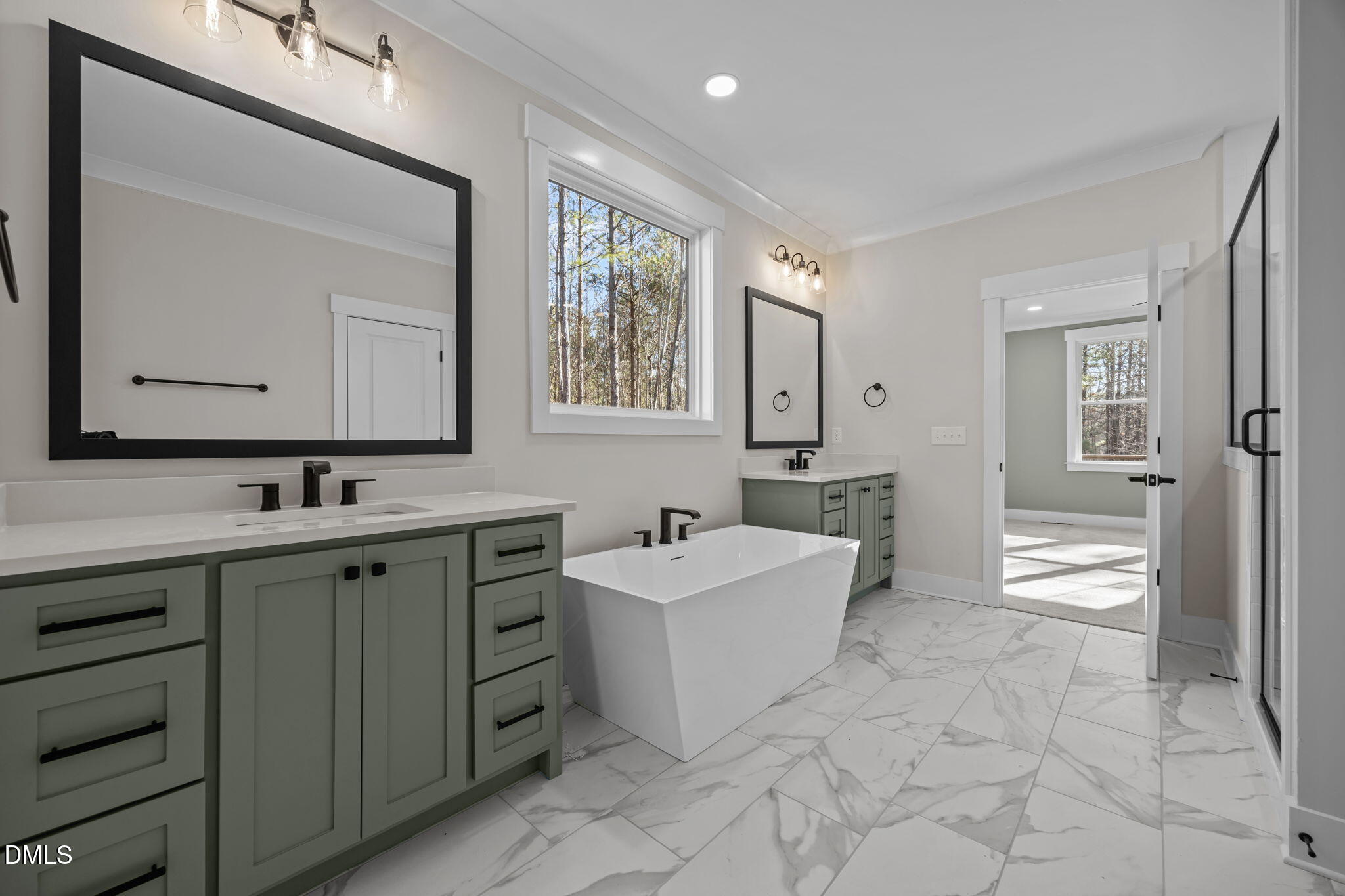 357 Slocum Drive Wendell, NC 27591 - Photo 23 of 48 a spacious bathroom with a double vanity sink mirror and bathtub