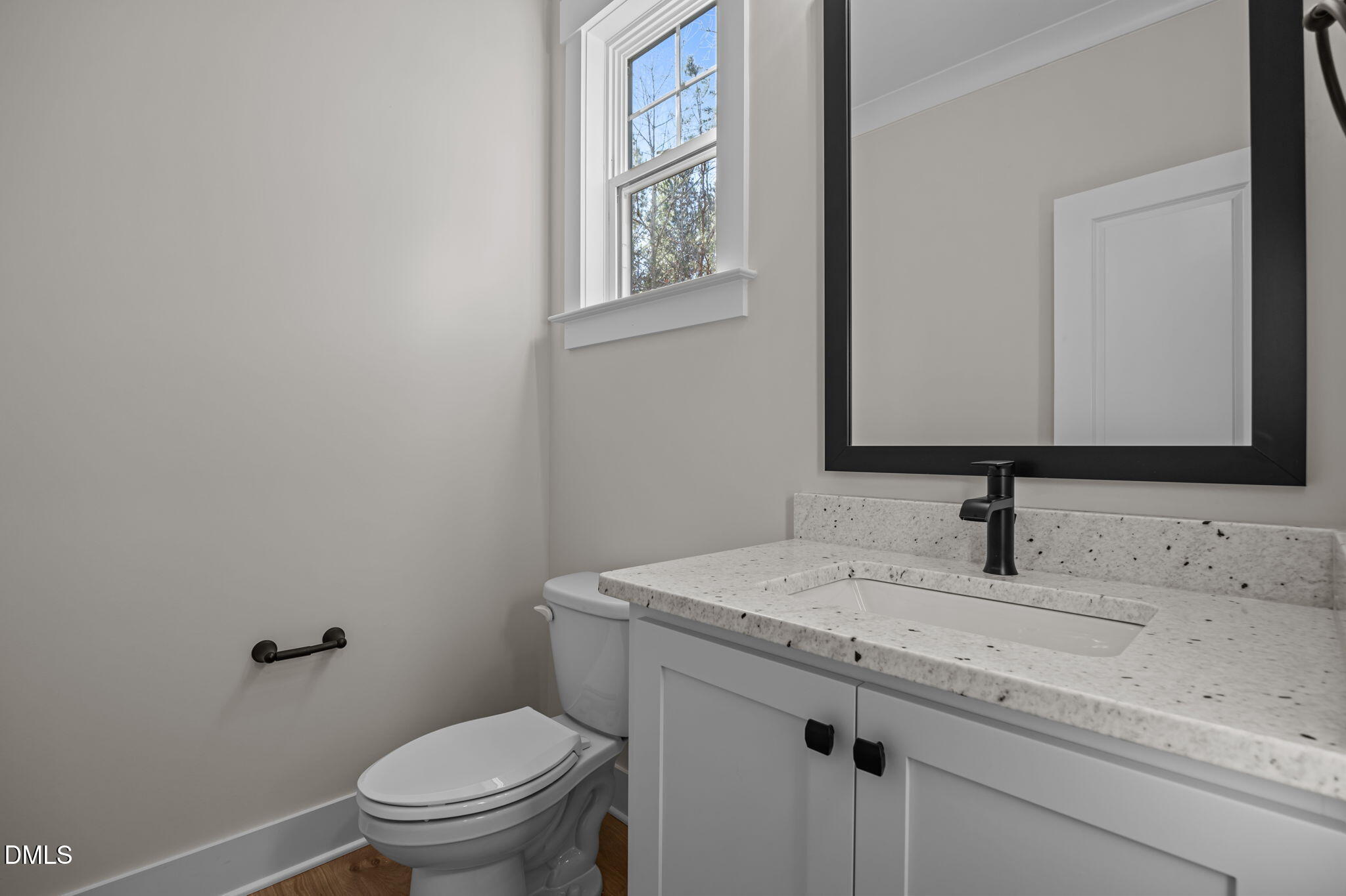 357 Slocum Drive Wendell, NC 27591 - Photo 29 of 48 a bathroom with a granite countertop toilet sink and mirror