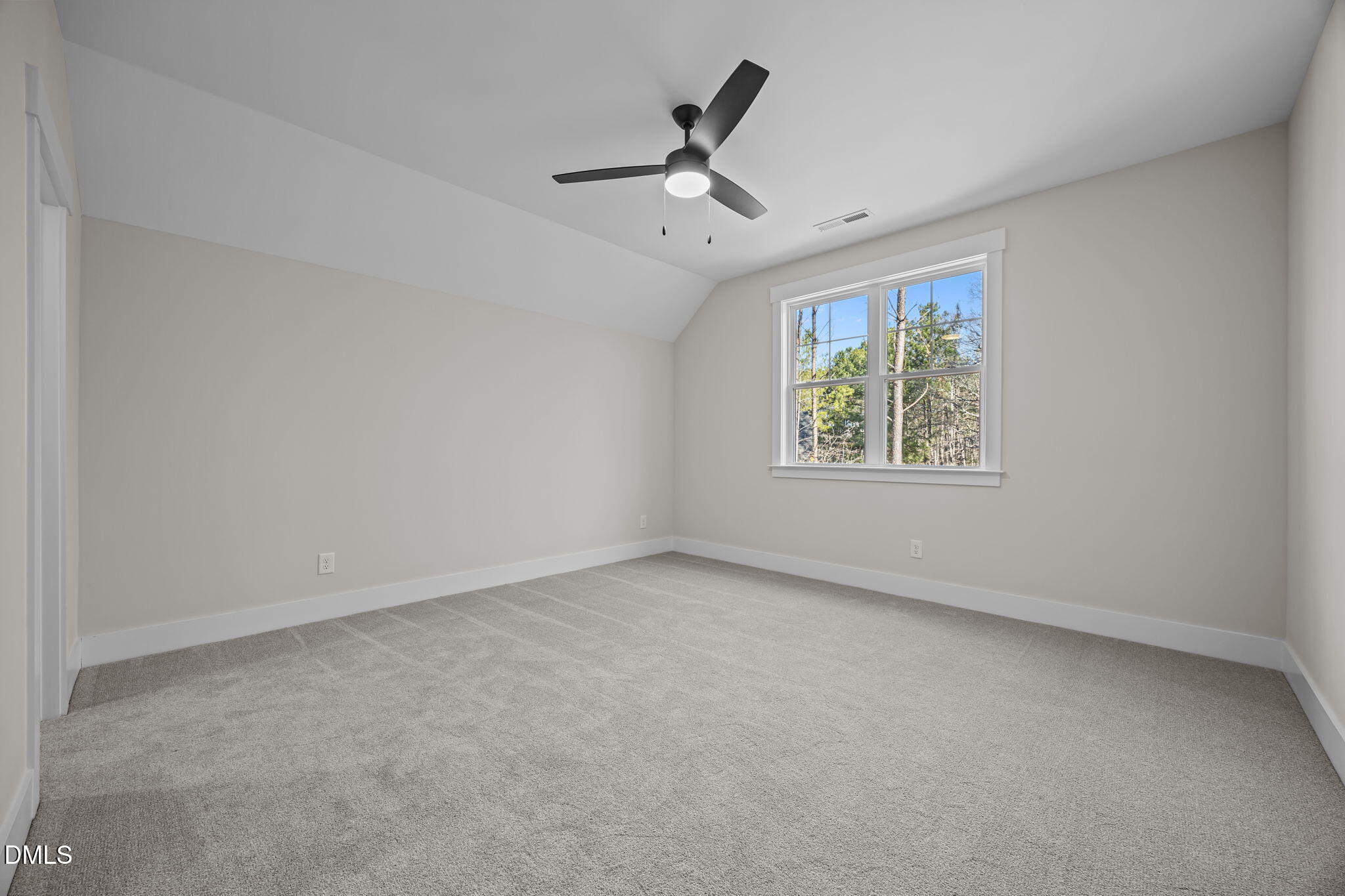 357 Slocum Drive Wendell, NC 27591 - Photo 33 of 48 a view of an empty room with a window