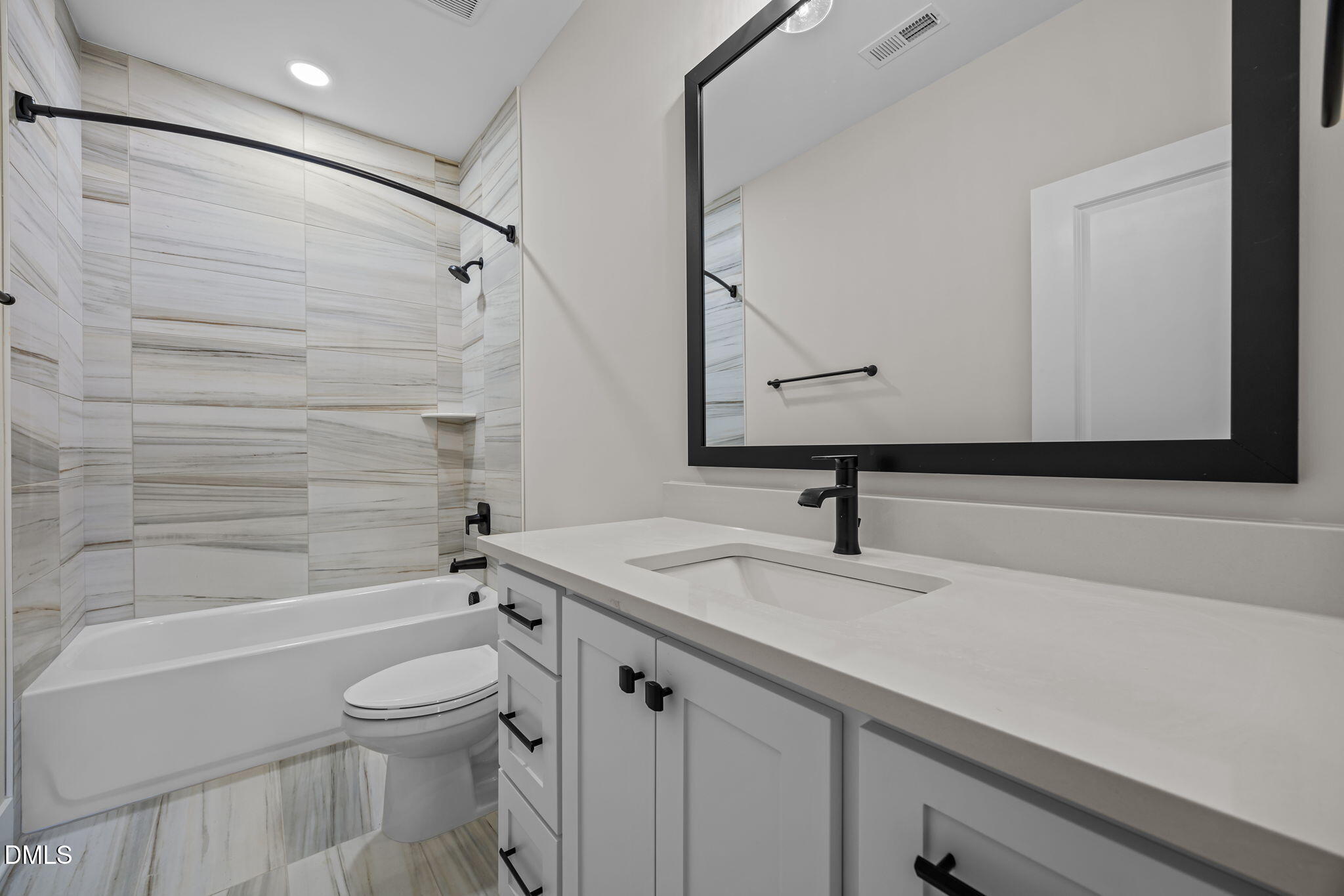 357 Slocum Drive Wendell, NC 27591 - Photo 34 of 48 a bathroom with a sink a toilet and shower